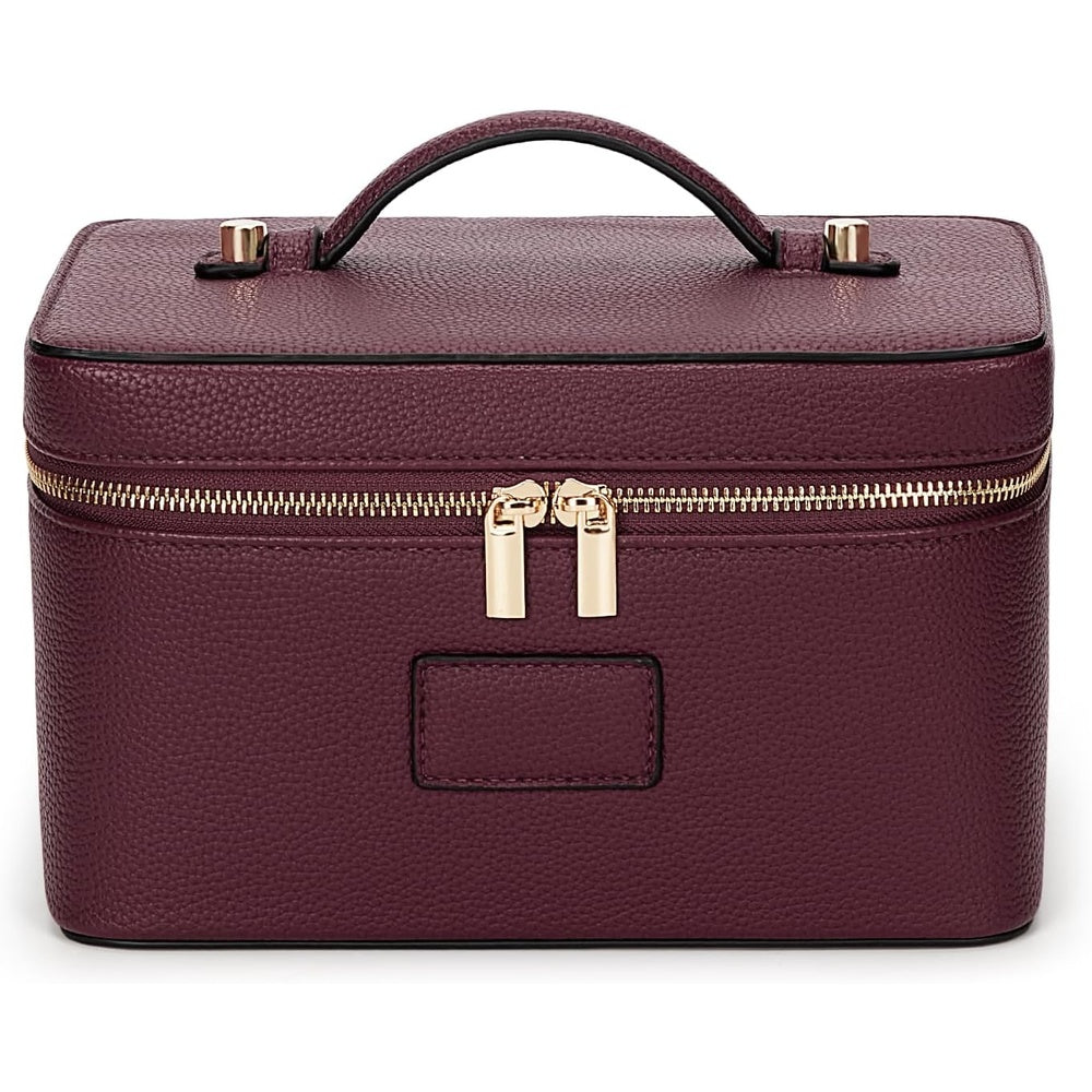 Burgundy vanity case with gold zip pulls and top handle, closed