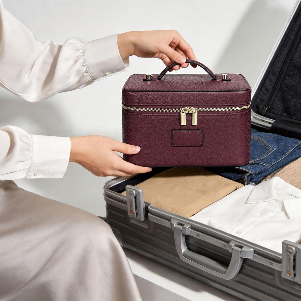 The case being packed into an open suitcase